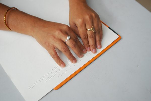 Accessible reading material to people with print disabilities